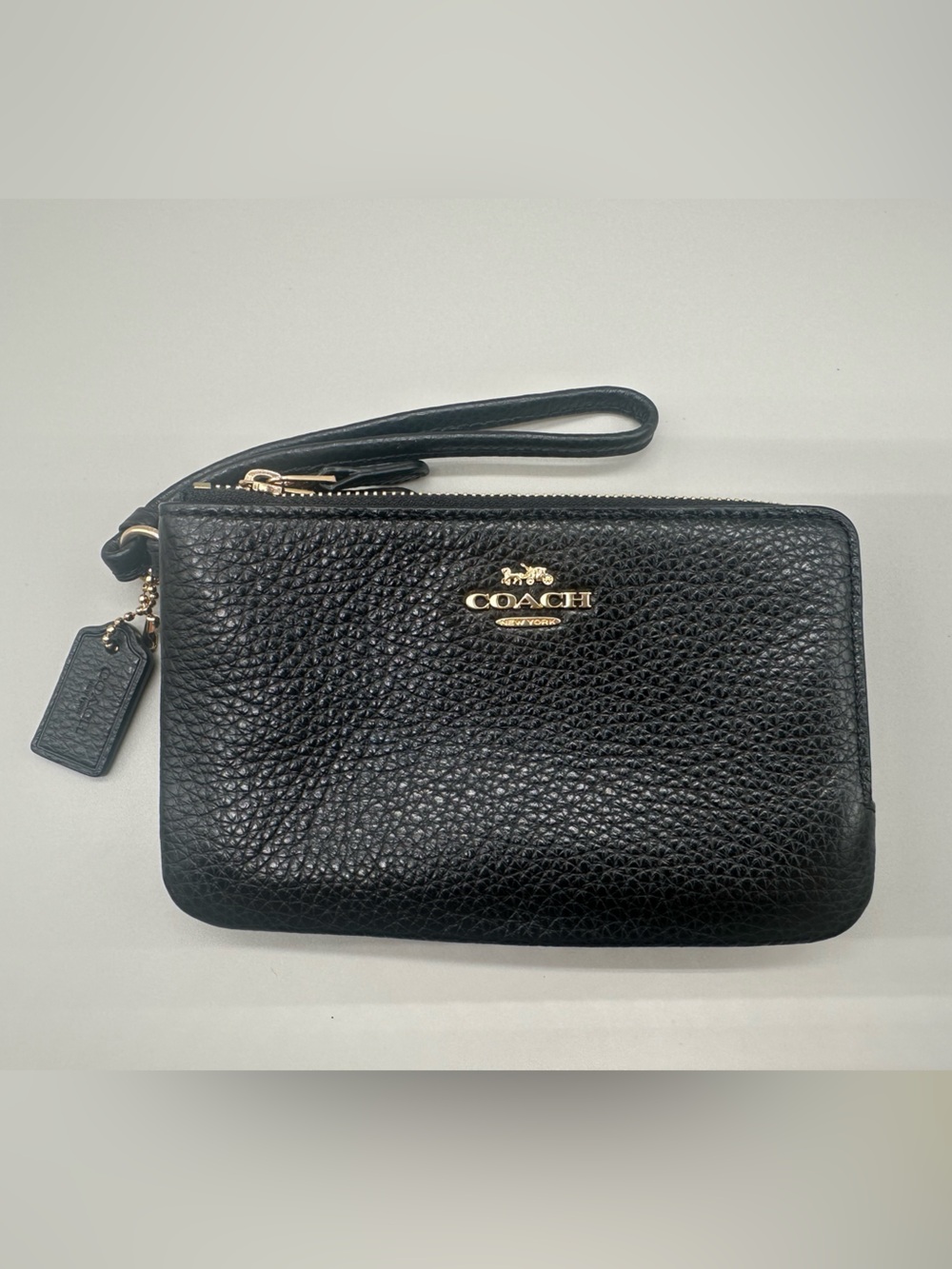 Coach Black Pebbled Leather Wristlet with Gold tone Logo
